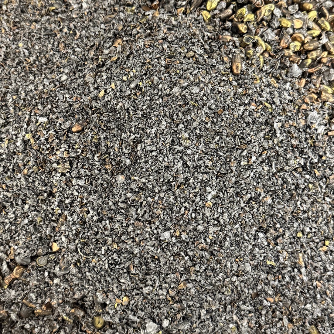 Fine lead material screened out of range media